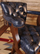 American made burnished blue leather bar chair with swivel seat and rustic Western styling