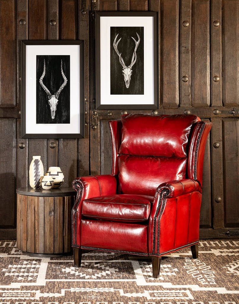 Burnished red leather arm chair and wall decor - Your Western Decor