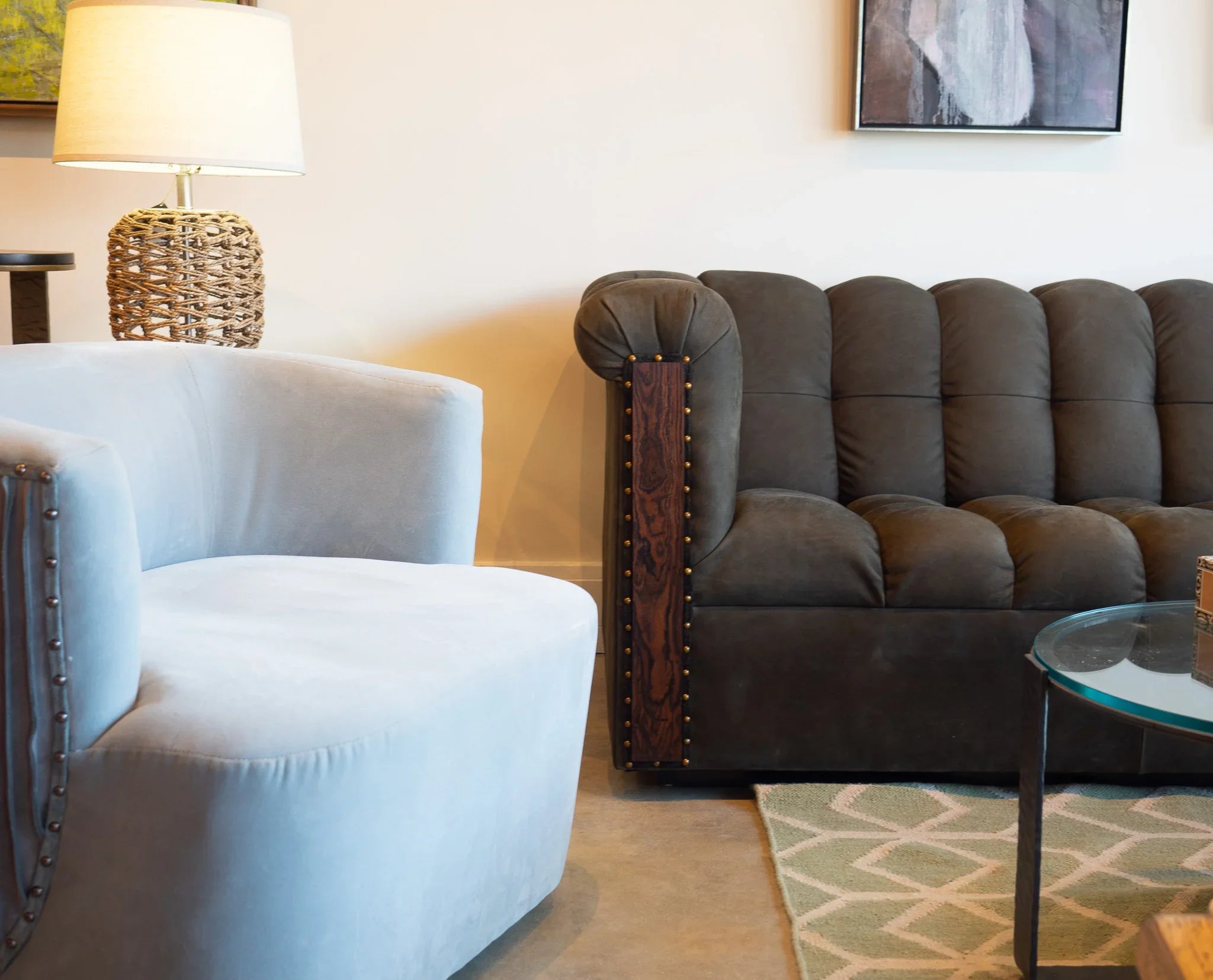 Living room with Camden leather sofa, light blue armchair, and a lamp - Your Western Decor