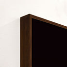 Close-up of a dark wooden frame corner on a white background - Your Western Decor