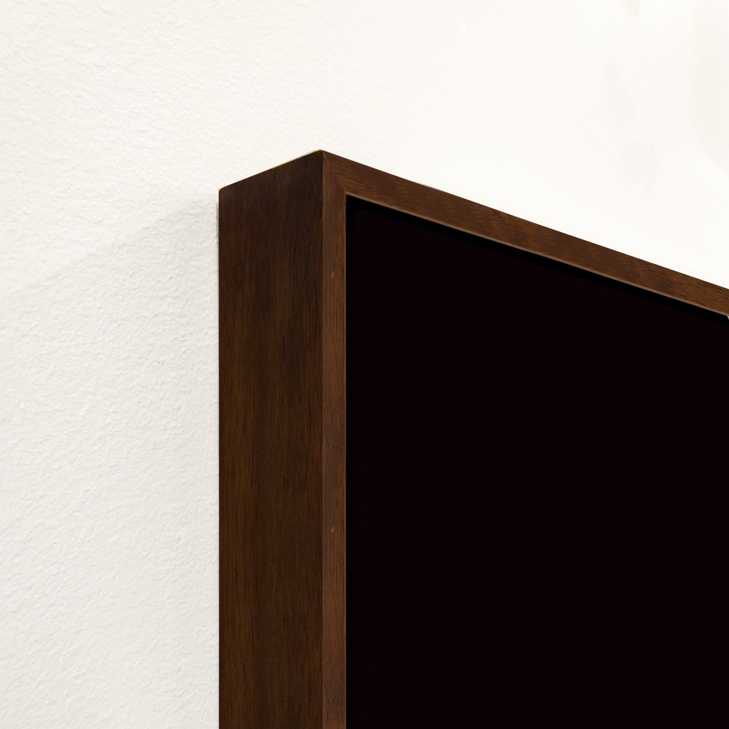 Close-up of a dark wooden frame corner - Your Western Decor
