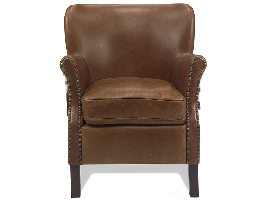 Brown leather chair with nail trim and tri color cowhide outback and outer arms 