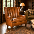American made leather wingback chairs in rustic lodge living room
