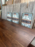 Chief Joseph Pendleton Sunbrella fabric dining chairs at wood table 