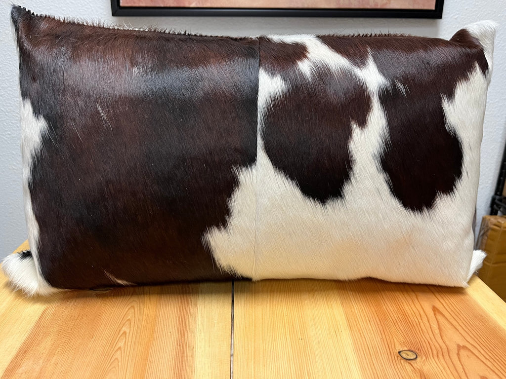 Chocolate and white 22x13 cowhide throw pillow - Your Western Decor