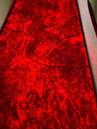 Close up detailed image of red rawhide on round 16" lamp shade 