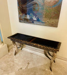 Handcrafted cowhide sofa table for ranch and lodge interiors