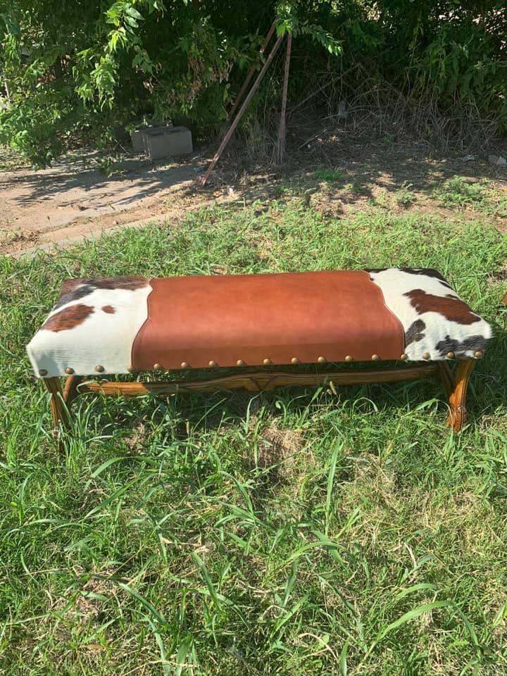 Custom made cowhide and leather benches with hand carved frames made in the USA - Your Western Decor