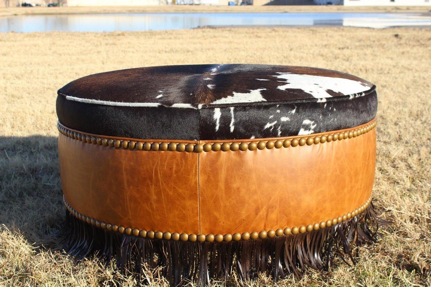 Custom handmade leather and cowhide ottoman with fringe 
