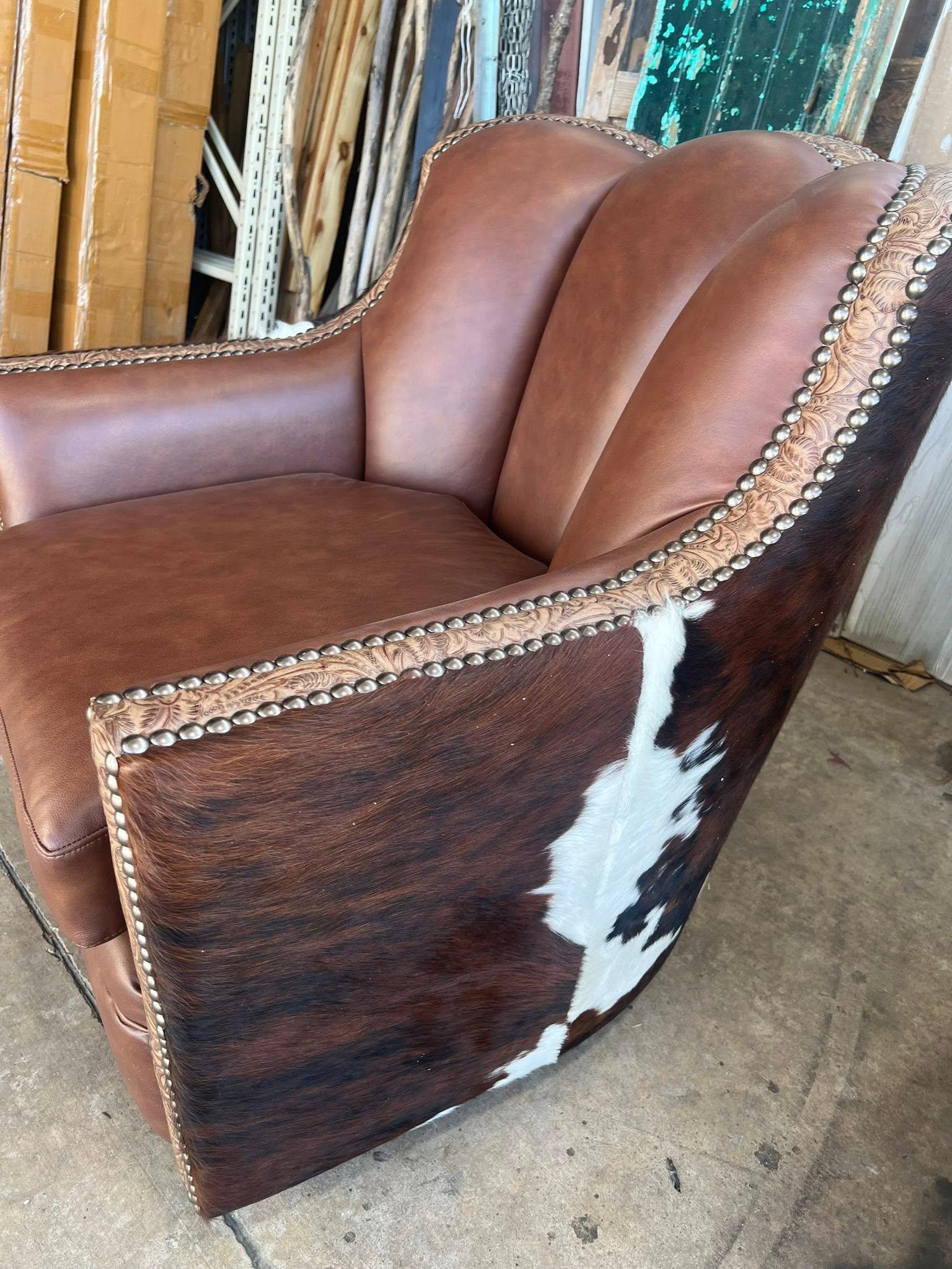 Custom leather and cowhide swivel glider - Your Western Decor