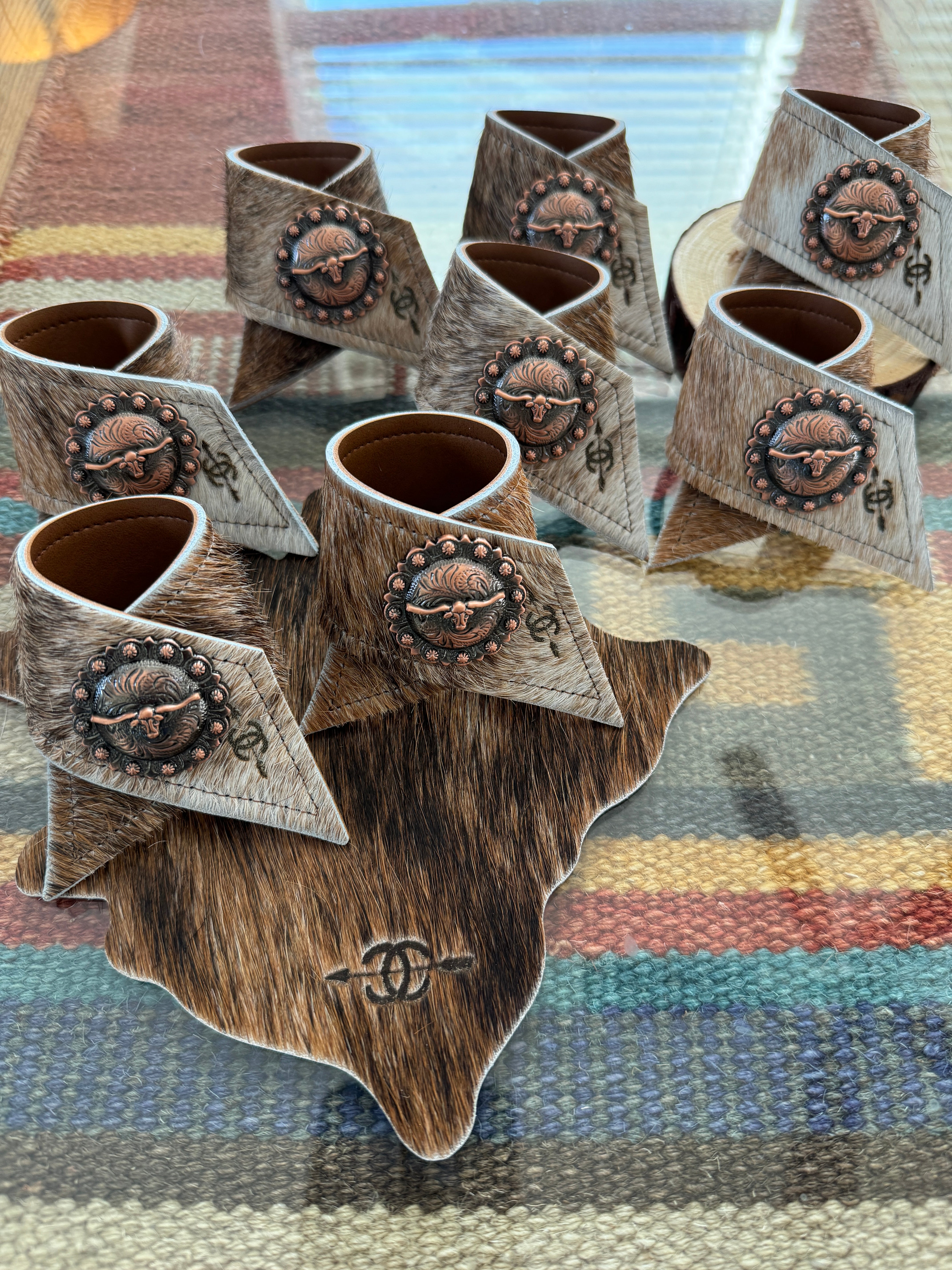 Custom laser branded cowhide napkin rings and coasters - Handmade by Your Western Decor