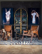 Luxury rustic lounge area with cabinet, horse art, leather chairs and decor - Your Western Decor