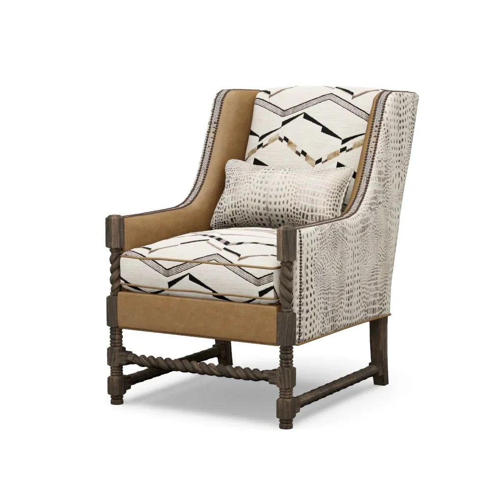 Decorative armchair with patterned cushions on a white background