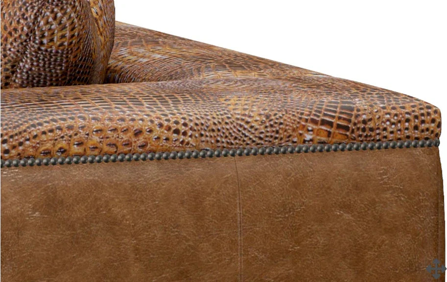 Brown leather armchair with textured backrest and studded detail on a white background - Your Western Decor