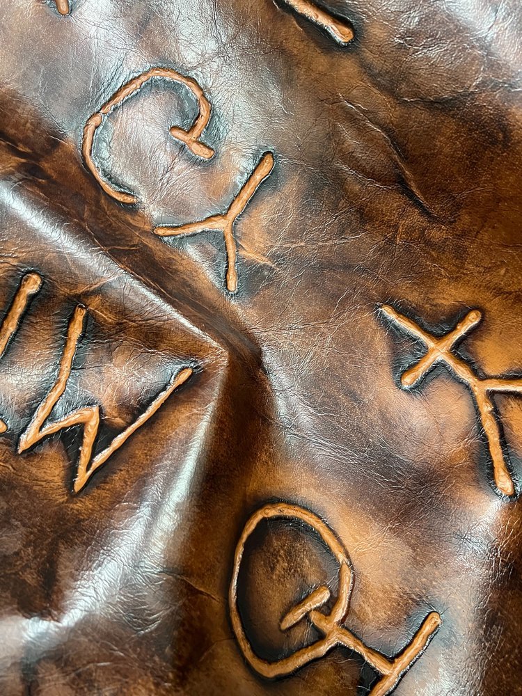 Dark Saddle Branded Embossed Leather