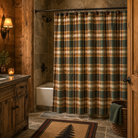 Deep Woods Plaid Shower Curtain made from 100% cotton in a luxury rustic lodge bathroom with stone flooring and wood plank walls.
