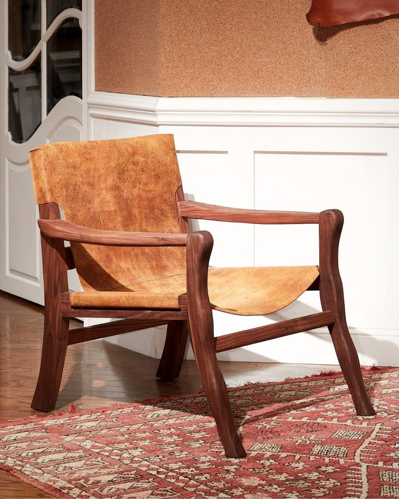 Distressed leather sling chair in Ragtime Paris leather - Your Western Decor