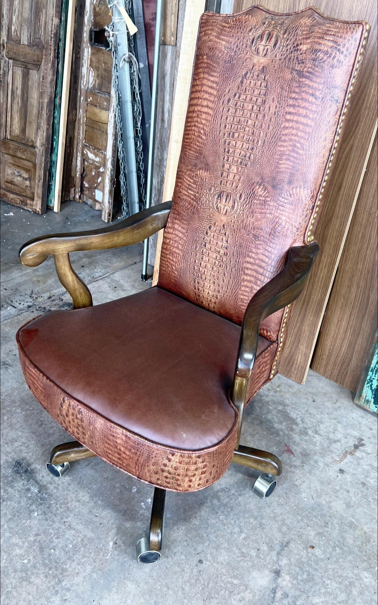 Luxury custom made executive office chair in smooth brown leather, croc embossed leather, and nail trim 