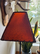 End view of rectangle amber rawhide lamp shade