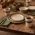 evergreen pines cabin dinnerware set rustic lodge stoneware plates bowls and mugs on wooden table
