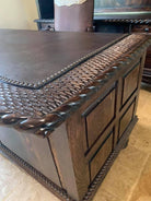 Custom Western Paneled Executive Desk detail of carving, leather surface, and nail trim