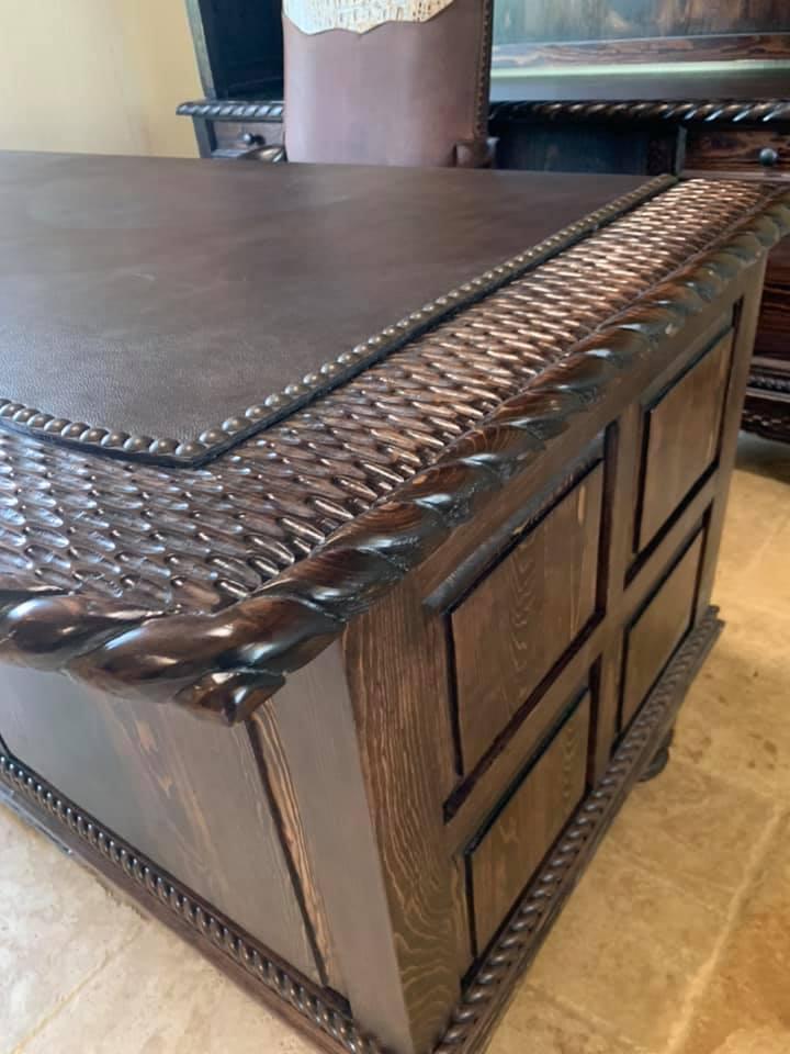 Custom Western Paneled Executive Desk detail of carving, leather surface, and nail trim