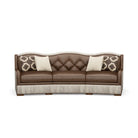 Front view of curved tufted leather sofa, American made, made to order