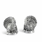 Two silver turkey-shaped salt and pepper shakers on a white background