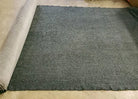 Dark green faux sheepskin fabric roll 