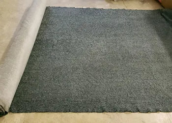 Dark green faux sheepskin fabric roll 