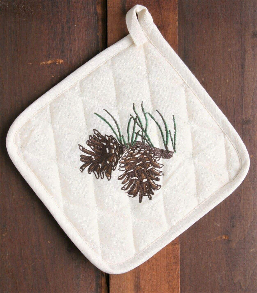 Ivory pot holder with pine cone embroidered design. Your Western Decor