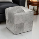 Gray patchwork cube ottoman in a living room setting - Your Western Decor