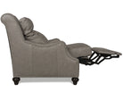 Side view of grey leather recliner, reclined with antiqued silver nail tacking 