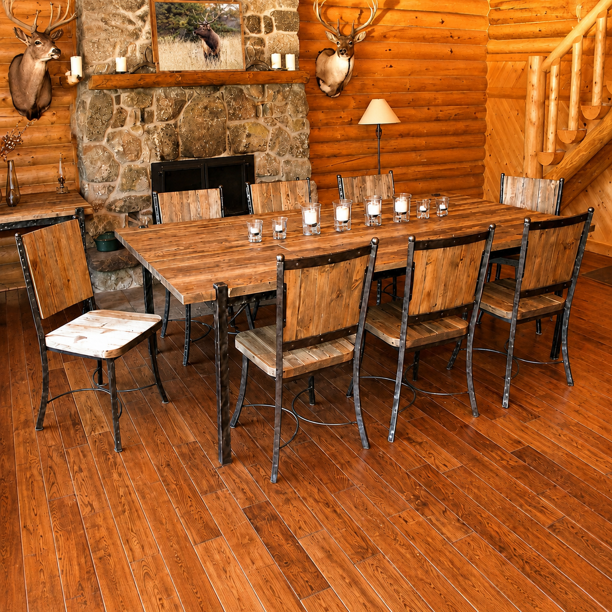 A rustic dining room set featuring a rectangular wooden table and six matching chairs with dark metal frames, set in a cabin with a stone fireplace and log walls.