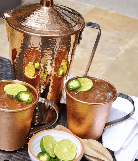 Hammered copper moscow mule mugs and pitcher with stainless steel handles. Your Western Decor