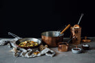 hammered copper cooking items and canister in peacock patina - Your Western Decor