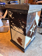 handcrafted cowhide laundry hamper with iron western star