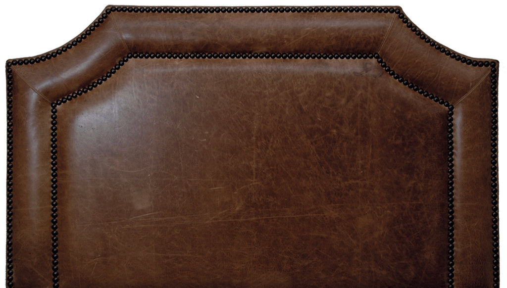 Dark brown distressed butte leather headboard with nail head trim. Western theme. Made in the USA. Your Western Decor