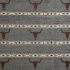 Patterned fabric with bull head designs and geometric patterns on a gray background - Your Western Decor