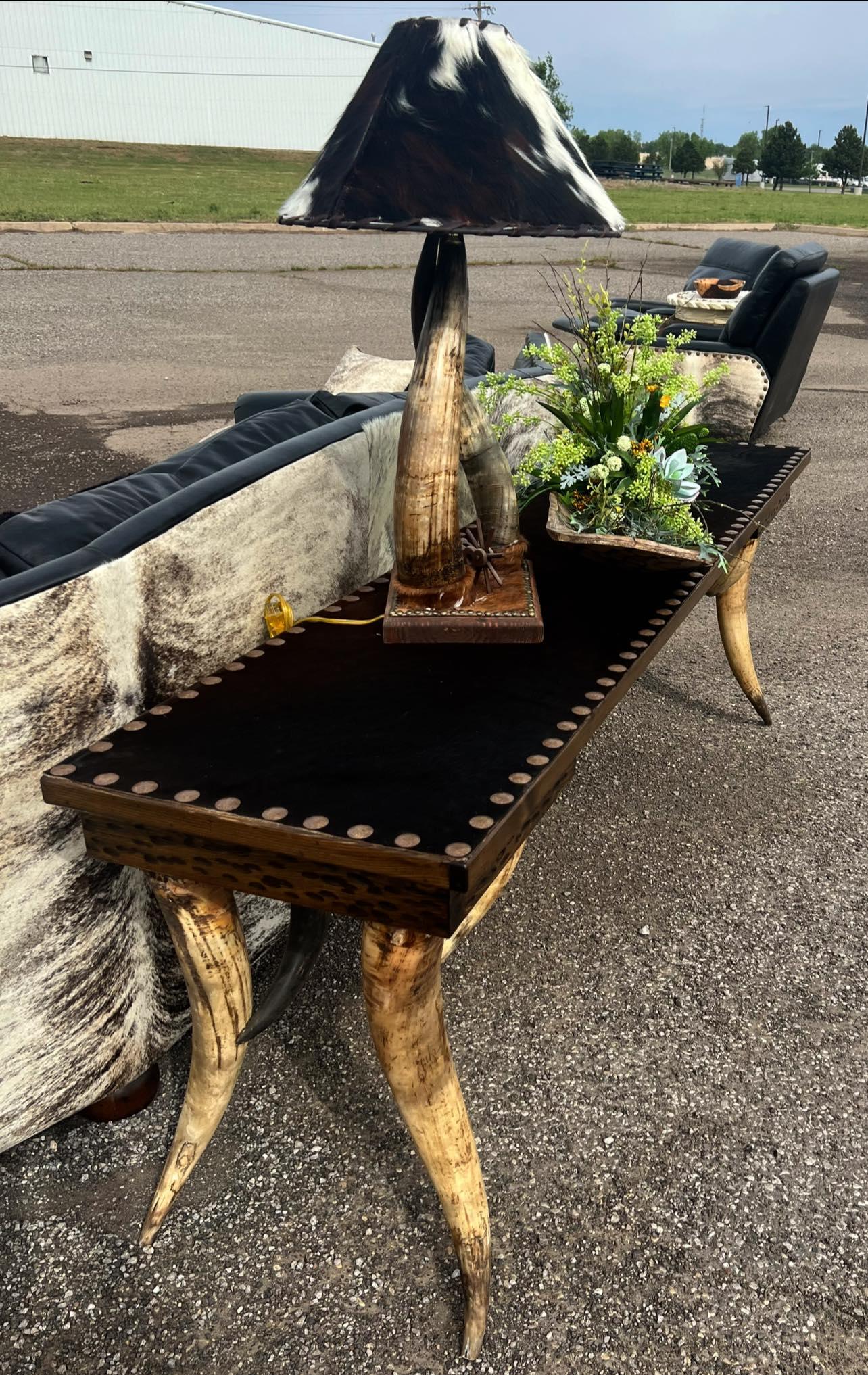 Custom length cowhide and longhorn sofa table with steer horn table lamp and cowhide lamp shade
