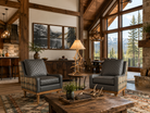 Luxury lodge accent chair with plaid upholstery and wood trim