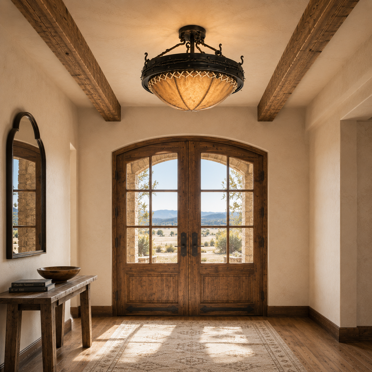 Luxurious interior with wooden double doors, a ceiling light fixture, and a mirror.