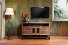 Iron Rail industrial media console in solid mango wood with rolling iron base