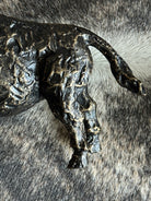 Close up detail of buffalo sculpture shelf decor western home