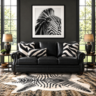 Iron Ridge Black Leather Sofa staged with zebra print rug, zebra wall art, and floor-to-ceiling windows in luxury lodge living room