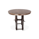 Round wooden table with metal base on a white background