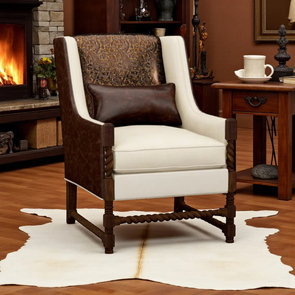 Decorative armchair with white cushion and brown leather accents in a cozy living room setting - Your Western Decor