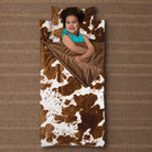 Shearling Kids Cow-Print Sleeping Bag & Pillow - Your Western Decor