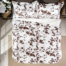 Kids western bedding quilt set with cowhide print. Quilt and shams