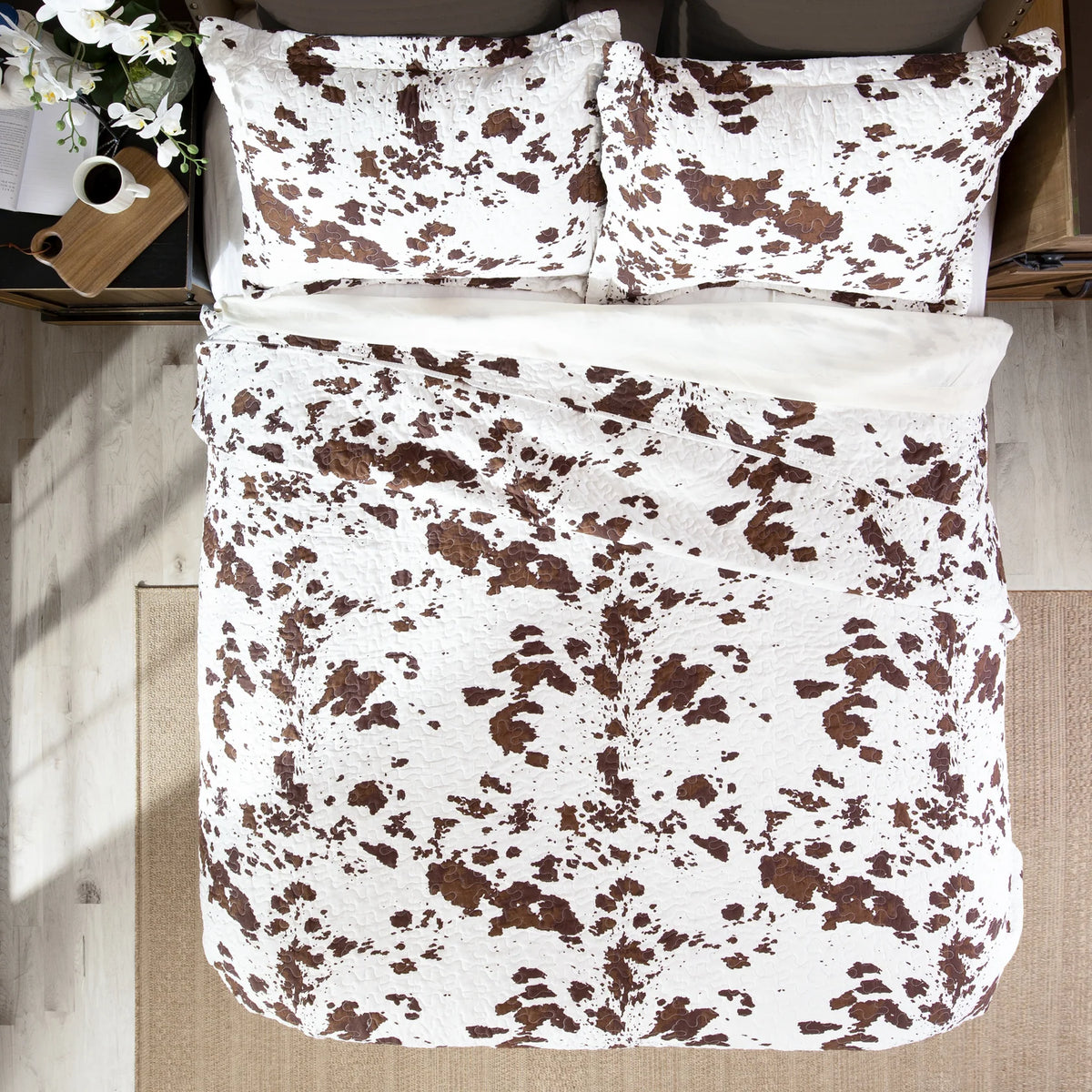 Kids western bedding quilt set with cowhide print. Quilt and shams